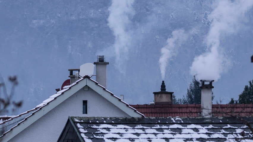 Image of in-efficient furnace chimney exhaust plumes that promotes global warming